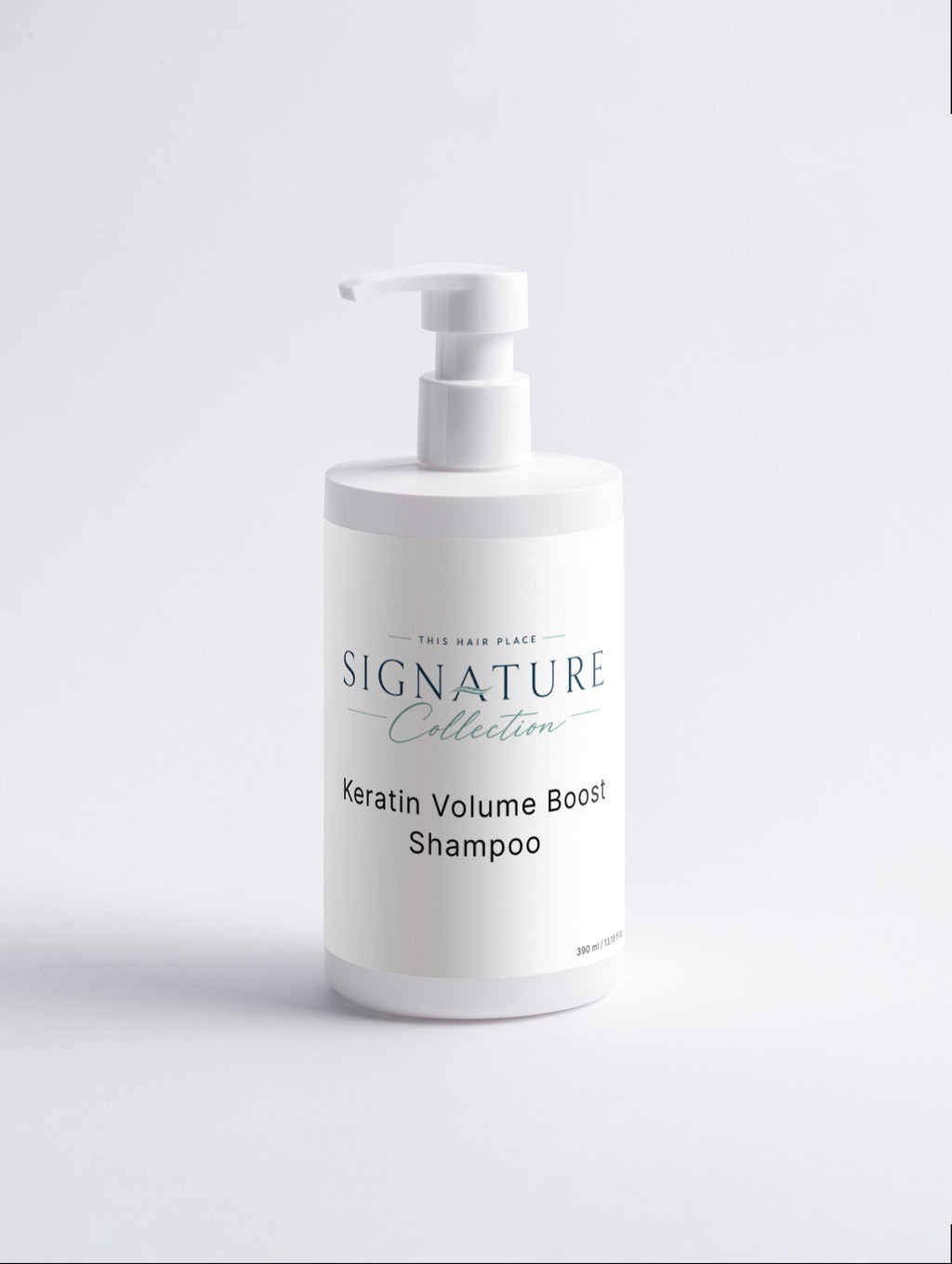 White shampoo bottle with pump labeled 'Signature Collection Sensitive Scalp Shampoo' on a light gray background